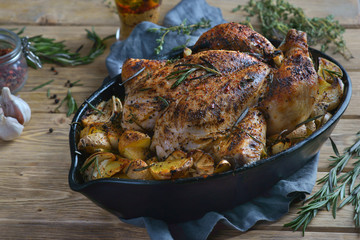 Baked chicken and potatoes for family dinner