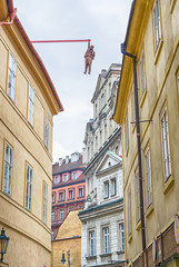 Prague, Czech Republic - 01.05.2019. The architecture of the old city of Prague. Man hanging out. Editorial use only