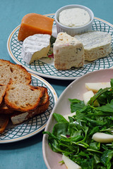 Mixed pear and green salad including leaves of blood dock red sorrel plant rumex sanguineus