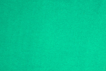 Fototapeta na wymiar soft green fabric background, close, short focus