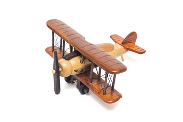 Wooden airplane model isolated on white background. Airplane isolated on a white background