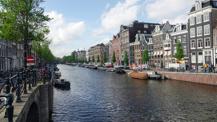 Fototapeta premium Traditional canal in old center of Amsterdam, Holland