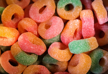 Different types of candy that give a beautiful color to the image.