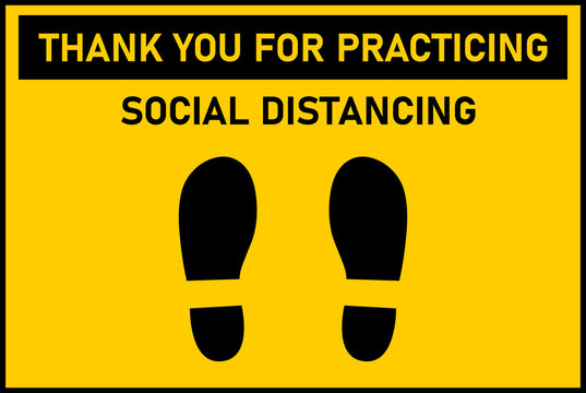 Yellow floor sticker sign with Thank you for practicing social distancing, foot shape on yellow. Signage for customer information used in shopping stores during coronavirus pandemic. Covid-19 measures
