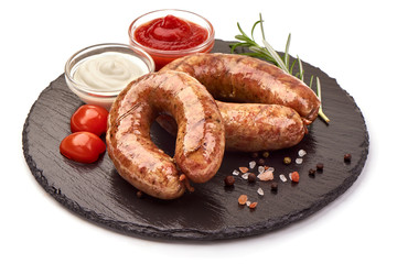 Grilled pork bangers, isolated on white background