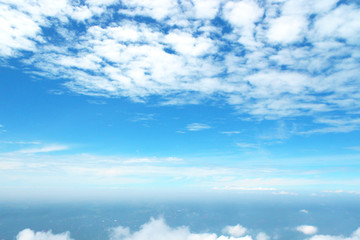 blue sky background with tiny clouds