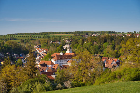 Landscape of Waldenbuch town with a view on the castle and the church tower on a sunny day during spring season.