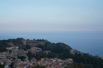 Fototapeta na wymiar view of Taormina city in Sicily, Italy from the top of the hill