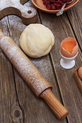 Dough for baking a pie on a dough board