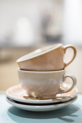 Pile of Empty Coffee Cup After Drink with Blurred Background
