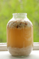 a can of kvass stands on a windowsill
