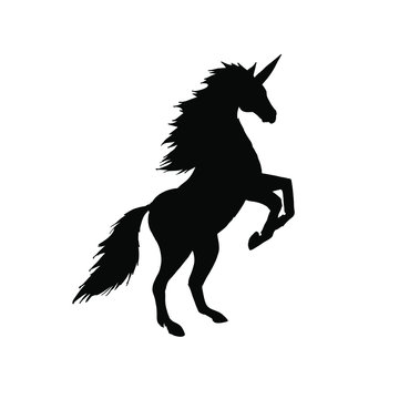 Vector black flat standing unicorn silhouette isolated on white background