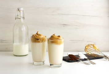 Dalgona coffee. Trendy korean cold drink with foam and milk