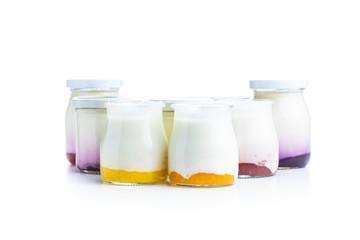 Fototapeta na wymiar White fruity yogurt in jar