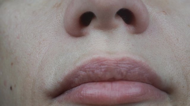 Macro shot of a woman's face.