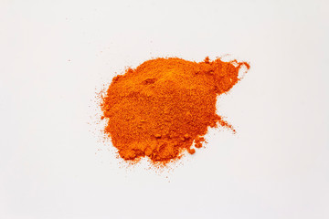 Hungarian sweet paprika powder isolated on white background
