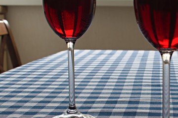 red wine in wine glasses on a restaurant table
