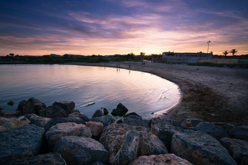 Fotografía Tomada en el espigón del Puerto de Sagunto. Se muestra un paisaje marinero en el cual...