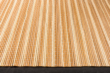 brown bamboo Mat - stand food, close-up, macro