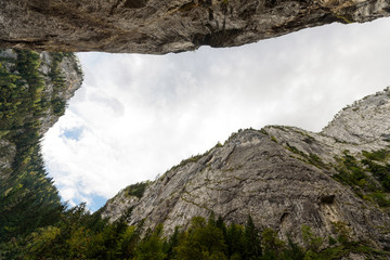 Bottom-up view on the Bicaz Canyon Gorge in the fall season. The canyon is one of the most impressive roads in Romania - the Carpathians. Bicaz Canyon (Cheile Bicazului).