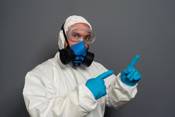 Fototapeta na wymiar epidemic specialist guy disinfectant control public places disinfecting cleaning arms crossed wear hazmat protective suit goggles mask isolated grey color background