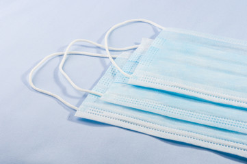 Background concept for news about the novel coronavirus COVID-19 pandemic, antiviral medical mask...