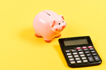 Savings. bookkeeping. financial problem. planning and counting budget. moneybox with calculator....