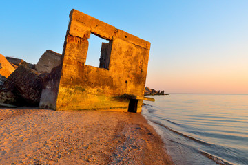 Naklejka premium The sea destroys the sea forts of the early 20th century.