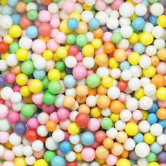Colourful round candy background, pastry decoration, close-up sweet