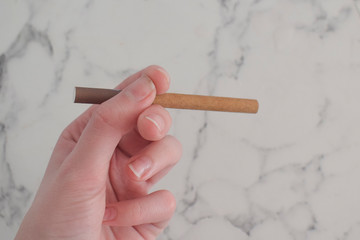 Cigarette in a woman's hand
