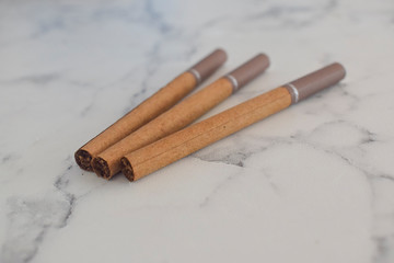Brown (chocolate) cigarettes with flavoring