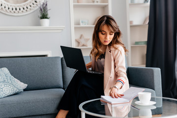 Many stuff to do today in home office, young beautiful woman working home