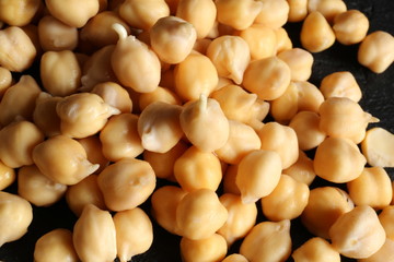 Sprouted chickpeas close-up on a black background