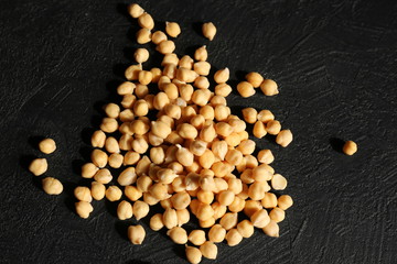 Sprouted chickpeas on a black background