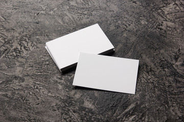 Business card blank on wooden background. Corporate Stationery, Branding Mock-up. Creative designer desk. Flat lay. Copy space for text