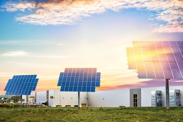 Solar battery on sunset sky background. 