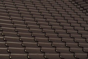 Fototapeta premium Close up a part of a brown roof of a house.