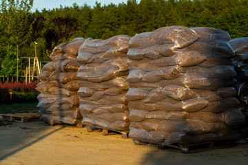 landscaped oak bark in bags for sale outdoors