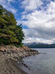 Fototapeta na wymiar lakes, trees and mountains at patagonia