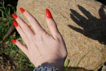 hand shadow on the stone