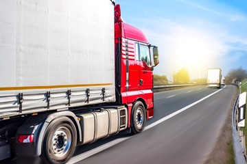 Truck moves on the road at speed, delivery of goods .Transport in Europe