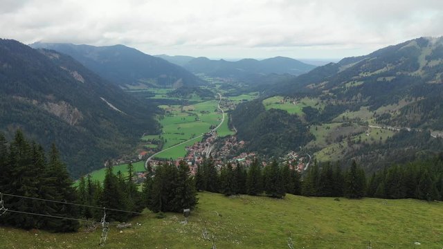 Bayrischzell municipality aerial view, with a view of Osterhofen town. German beautiful nature and green forests, Bavaria, Germany. The village Bayrischzell in mountains of Alps, Bavaria Germany.