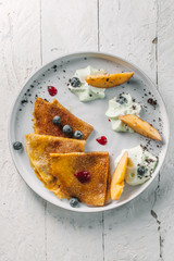 pancakes with sauce and fruit