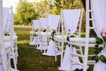 Close up white vintage chairs decorated
