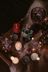 Still life of wedding decorations, candles and wine