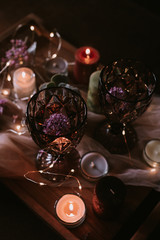 Still life of wedding decorations, candles and wine