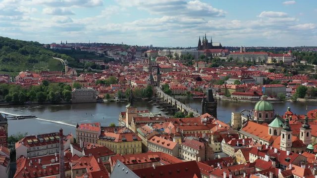 Prague scenic spring aerial view of the Prague Old Town pier architecture and Charles Bridge over Vltava river in Prague, Czechia. Old Town of Prague, Czech Republic.