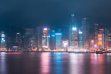 Victoria Harbor of  Hong Kong skyline at night