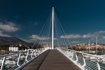 Fototapeta na wymiar pedestrian white bridge in the Italian city of La Spezia on the Ligurian sea coast