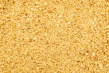 Ground peanuts texture background peanut candy